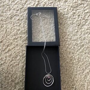 Elegant Silver Necklace with Purple Accent